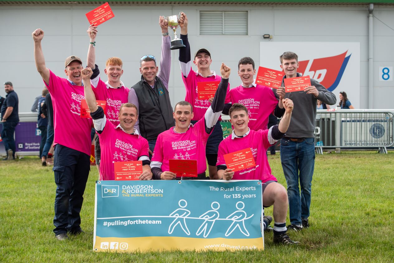 Beith YFC Gents presented trophy by Niall Milner D&R Director sponsors of the event